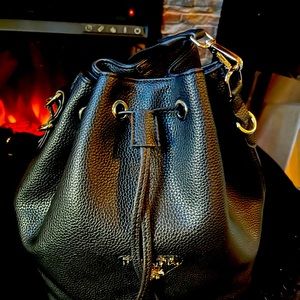 Prada leather cinch bag brand new. Never worn